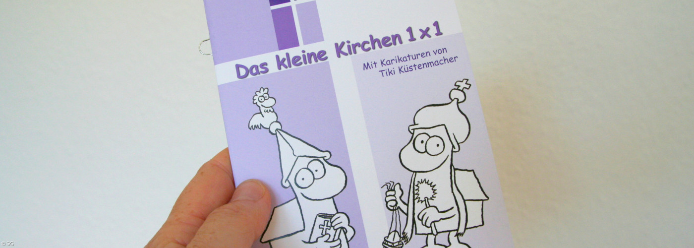 Kleines Heft mit einem Cartoon und der Überschrift Kirchen 1mal1